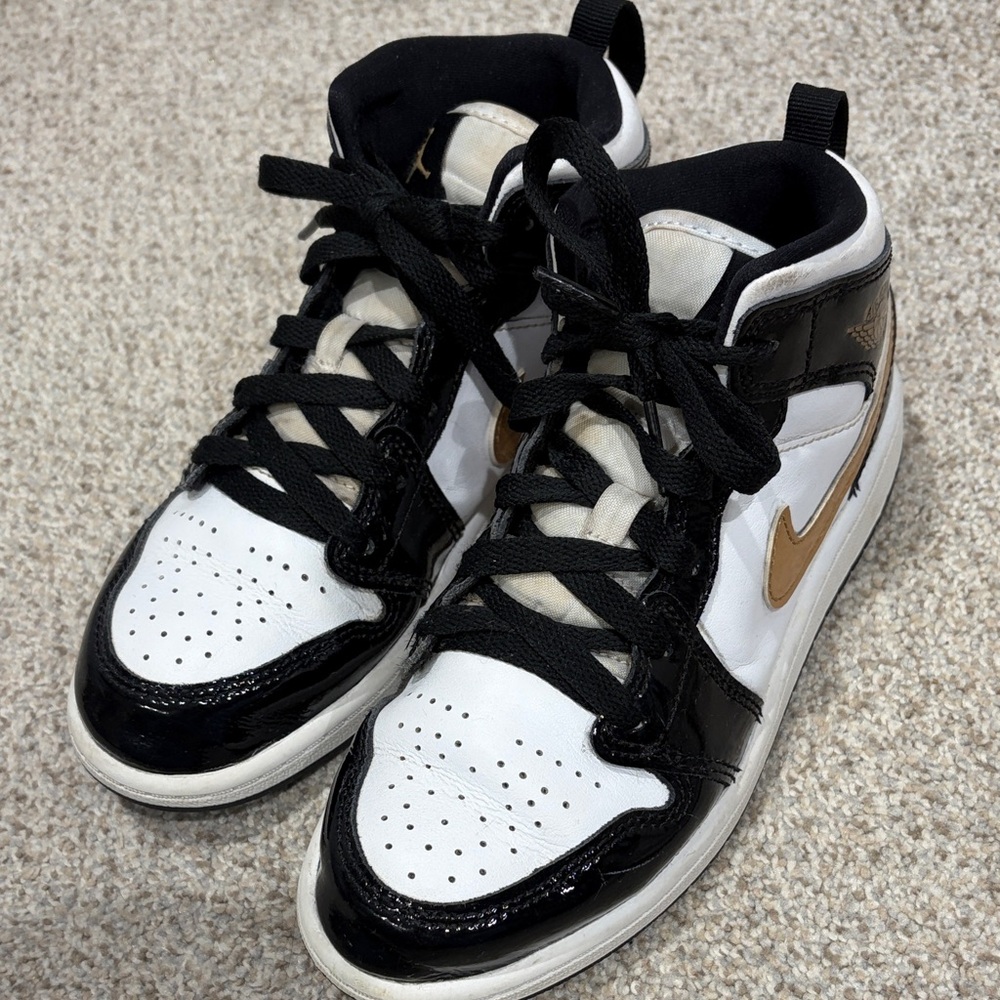 Nike Air Jordan Black/Gold High Top Sneakers